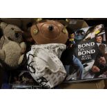 A TRAY OF ASSORTED SUNDRIES TO INCLUDE A ROGER MOORE JAMES BOND BOOK WITH SIGNATURE BUT NOT AUTHENTI