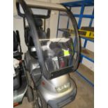 A LARGE ELECTRIC MOBILITY SCOOTER WITH CANOPY - KEY & CHARGER