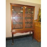 AN ANTIQUE MAHOGANY GLAZED DISPLAY CABINET RAISED ON BALL AND CLAW FEET H-164 W-108 CM