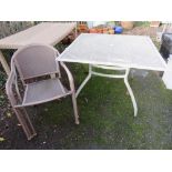 A METAL SQUARE PATIO TABLE AND 4 CHAIRS