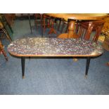 A MID-CENTURY FORMICA TOPPED COFFEE TABLE