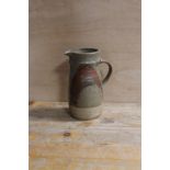 A LARGE STUDIO POTTERY STONEWARE JUG POSSIBLY BY MICHAEL CASSON