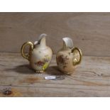 A ROYAL WORCESTER SMALL BLUSH IVORY JUG TOGETHER WITH ANOTHER - THE SECOND HAVING DAMAGES