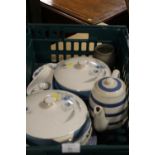 A TRAY OF RETRO CERAMICS TO INCLUDE A BLUE AND WHITE STRIPED TEAPOT