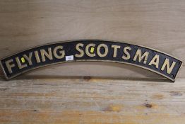 A REPRODUCTION CAST METAL FLYING SCOTSMAN NAMEPLATE