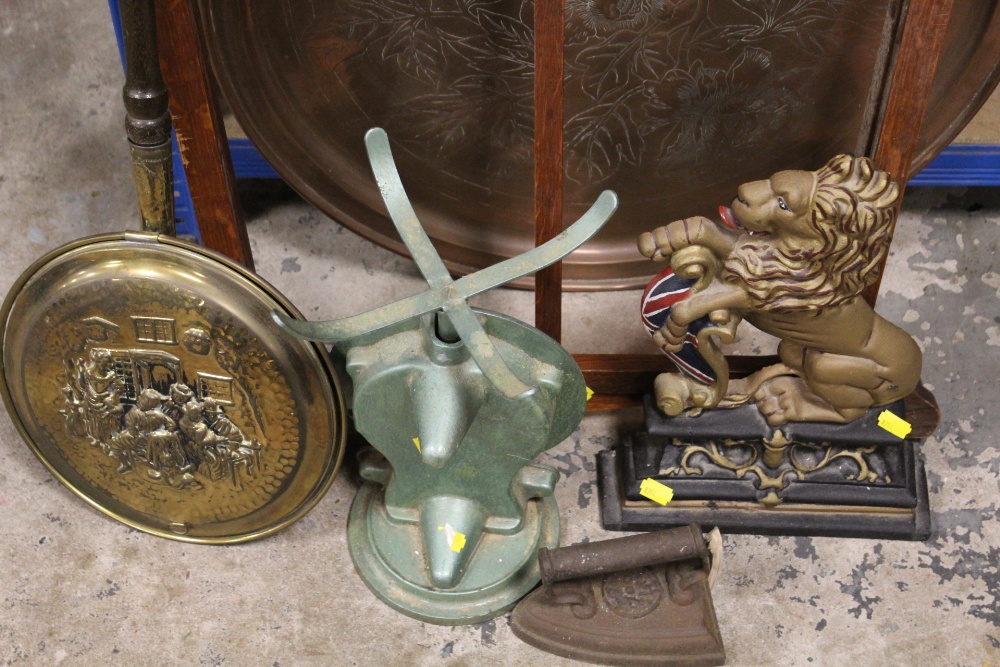 A CAST IRON RAMPANT LION DOOR STOP, BRASS TRAY ON STAND ETC