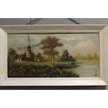 A FRAMED OIL ON CANVAS OF A WINDMILL SCENE SIGNED LOWER RIGHT K.P.DOWNER