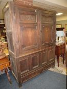 A LARGE 18TH CENTURY OAK CUPBOARD - DATED 1706 WITH A SINGLE DRAWER BELOW H-210 W-153 CM