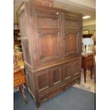 A LARGE 18TH CENTURY OAK CUPBOARD - DATED 1706 WITH A SINGLE DRAWER BELOW H-210 W-153 CM