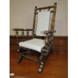 A CHILDS EDWARDIAN AMERICAN STYLE ROCKING CHAIR