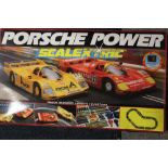 A SCALEXTRIC PORSCHE POWER SET (UNCHECKED)