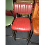 A RED LEATHER BAR/KITCHEN STOOL