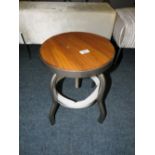 A LOW INDUSTRIAL STYLE WIND-UP STOOL