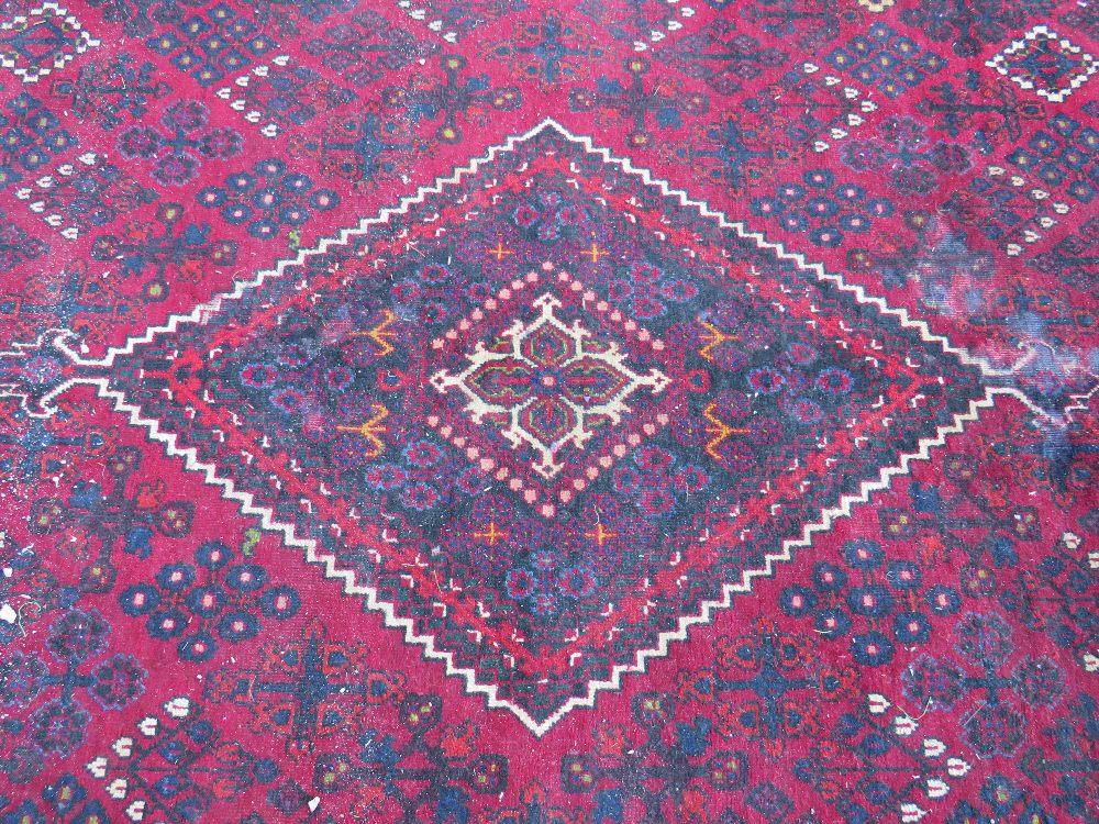 A LARGE IRANIAN CARPET - NAVY GROUND, APPROX 330 X 215 CM - WEAR THROUGHOUT - Image 6 of 10