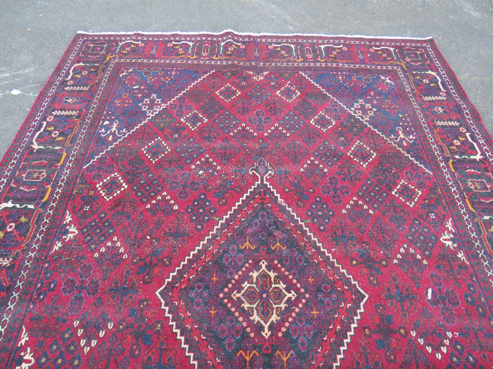 A LARGE IRANIAN CARPET - NAVY GROUND, APPROX 330 X 215 CM - WEAR THROUGHOUT - Image 2 of 10