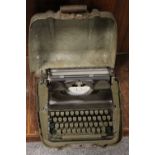 A DECO CASED PORTABLE TYPEWRITER