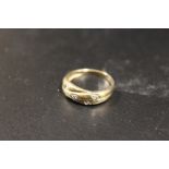 A 9CT GOLD DIAMOND SET DRESS RING