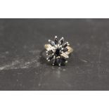 A 9CT GOLD LARGE SAPPHIRE CLUSTER DRESS RING
