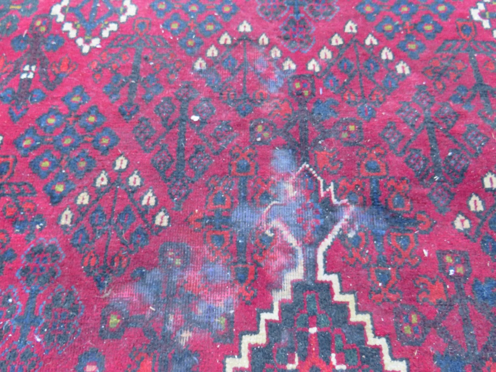 A LARGE IRANIAN CARPET - NAVY GROUND, APPROX 330 X 215 CM - WEAR THROUGHOUT - Image 10 of 10