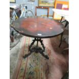 A CAST BASE CIRCULAR PUB STYLE TABLE