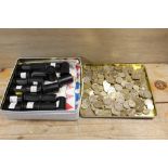 A TUB OF TWO AND ONE POUND COINS TOGETHER WITH ONE TIN OF ASSORTED MODERN BRITISH COINAGE