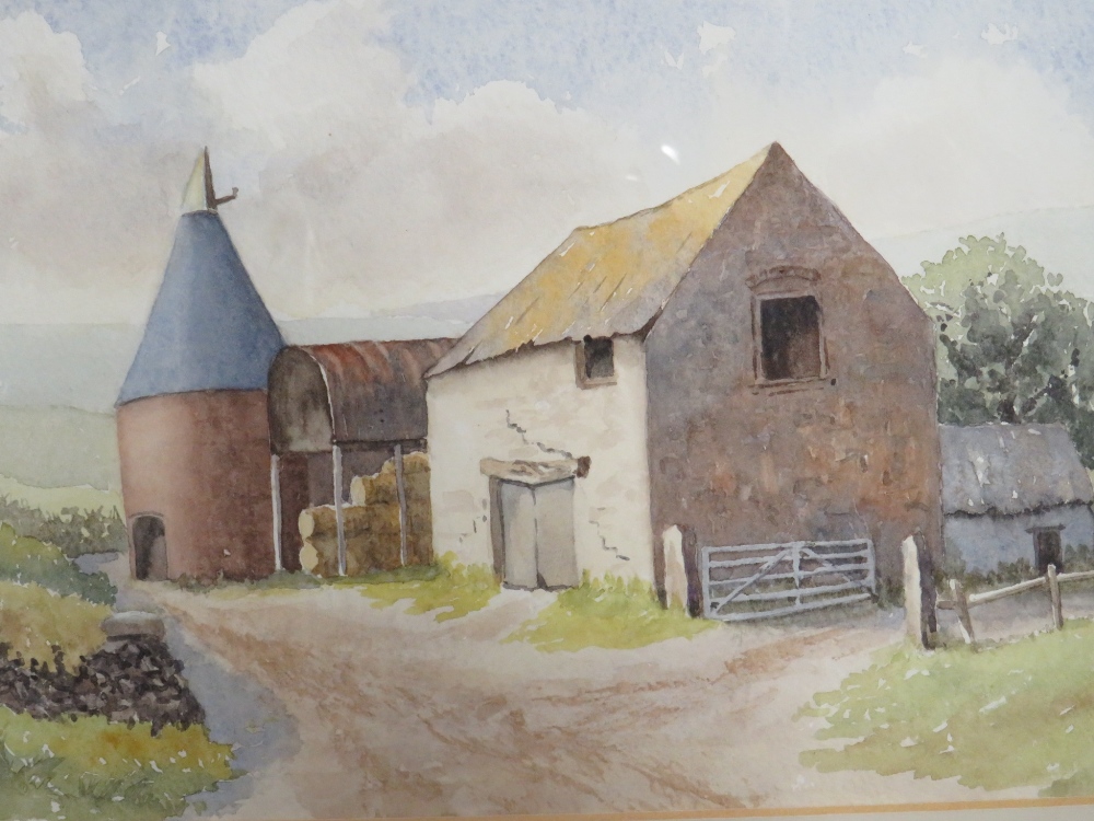 A WATERCOLOUR BY MOIRA MILLIKEN 'OLD FARM BUILDING - OAST HOUSE' SINGED M.M., TOGETHER WITH