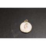 A VICTORIAN 9CT GOLD DOUBLE SIDED LOCKET