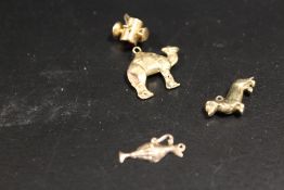 FOUR 9CT GOLD CHARMS