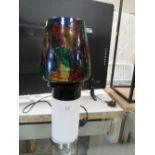 A TABLE LAMP WITH COLOURED GLASS