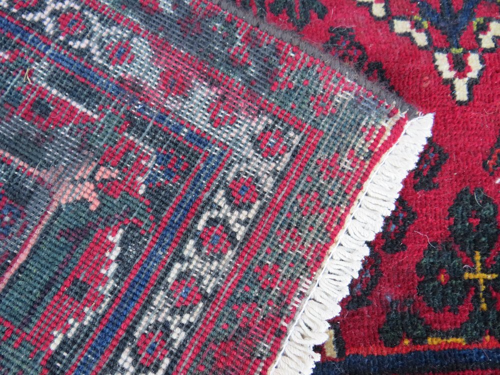 A LARGE IRANIAN CARPET - NAVY GROUND, APPROX 330 X 215 CM - WEAR THROUGHOUT - Image 5 of 10