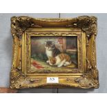 A SMALL GILT FRAMED MODERN PICTURE OF TWO KITTENS