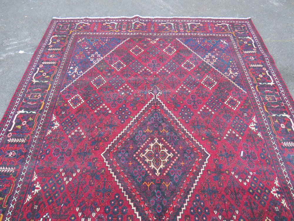 A LARGE IRANIAN CARPET - NAVY GROUND, APPROX 330 X 215 CM - WEAR THROUGHOUT - Image 3 of 10