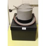 A SIZE 7 1/8 GREY TOP HAT TOGETHER WITH A CHRISTYS` LONDON HAT BOX AND MEASURING CALLIPERS .