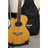 A STAGG LEFT HANDED ELECTRIC ACOUSTIC GUITAR AND STAND
