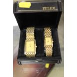 A BOXED PELEX GOLD PLATED STYLE HIS AND HERS WRISTWATCH SET