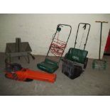 A SELECTION OF GARDEN TOOLS TO INCLUDE A FLYMO LEAF VAC AND A QUALCAST POWERED RAKE AND WHEELBARROW