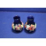 TWO SMALL MOORCROFT VASES BOTH A/F