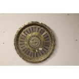 A LARGE BRASS CHARGER 60CM DIAMETER