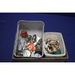 A TRAY OF COLLECTABLES TO INCLUDE PLASTIC FIGURES, BADGES, SPOONS ETC
