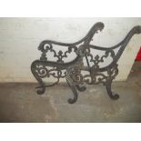 TWO ANTIQUE CAST IRON BENCH ENDS