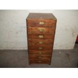 A COLONIAL STYLE CHEST OF 8 DRAWERS