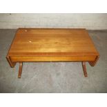 A TEAK DROP LEAF COFFEE TABLE