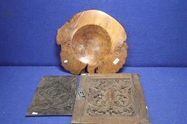 A BURRWOOD TURNED BOWL AND TWO CARVED PANELS