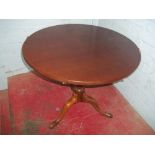 A GEORGIAN TILT TOP MAHOGANY TABLE