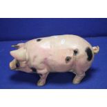 AN UNUSUAL CAST FIGURE OF A PIG