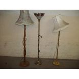 THREE FLOOR STANDING STANDARD LAMPS INCLUDING TIFFANY STYLE ONE AND A BRASS ONE