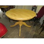 A MODERN CIRCULAR PEDESTAL TABLE