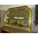 A MODERN GILT FRAMED OVERMANTLE MIRROR W-105 CM