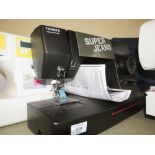 A TOYOTA SUPER JEANS ELECTRIC SEWING MACHINE - HOUSE CLEARANCE