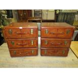 A PAIR OF MODERN LEATHER EFFECT SUITCASE BEDSIDE CHESTS H-62 W-54 CM (2)